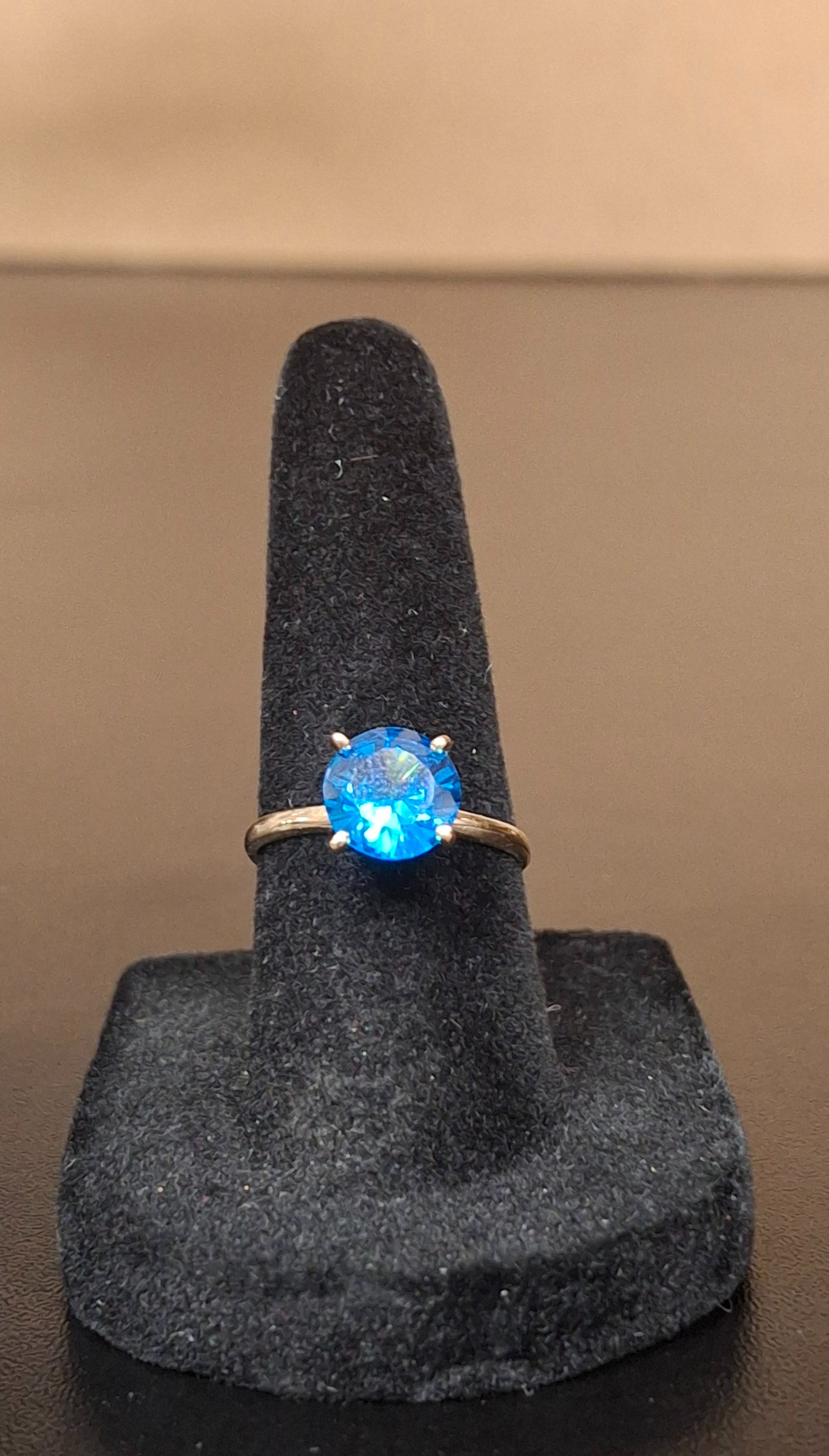 BLUE SOL RING.: 1.23DWT 10K-Y/G