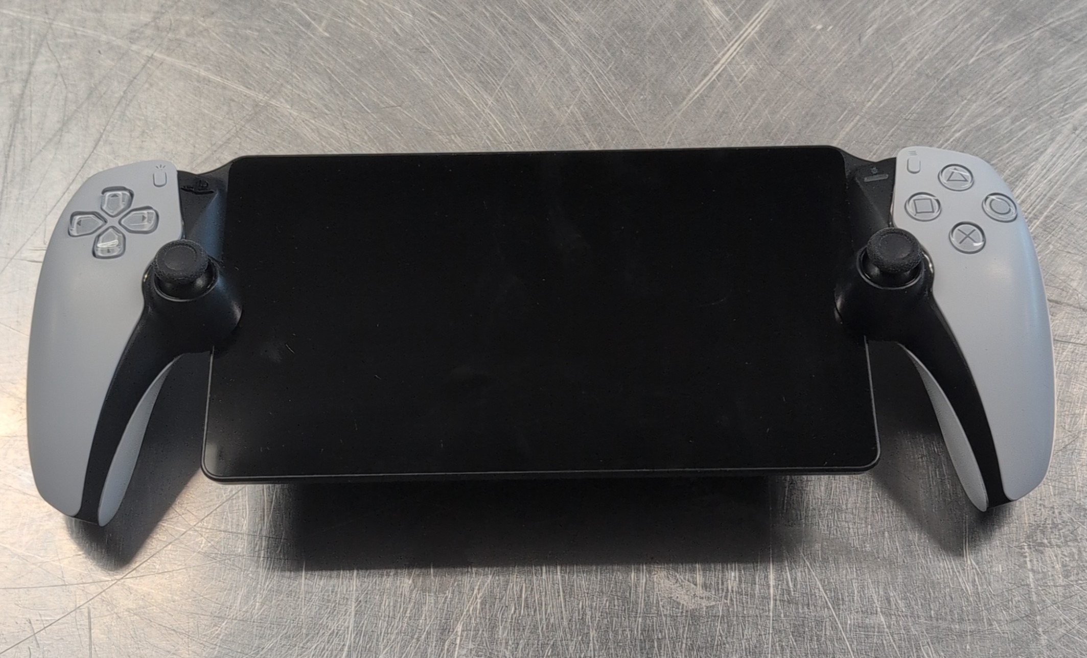 VIDEO GAME CONTROLLER: SONY MODEL PS5 - PORTAL REMOTE PLAYER - CFI-Y1001, SERIAL NUMBER H30565, BLACK